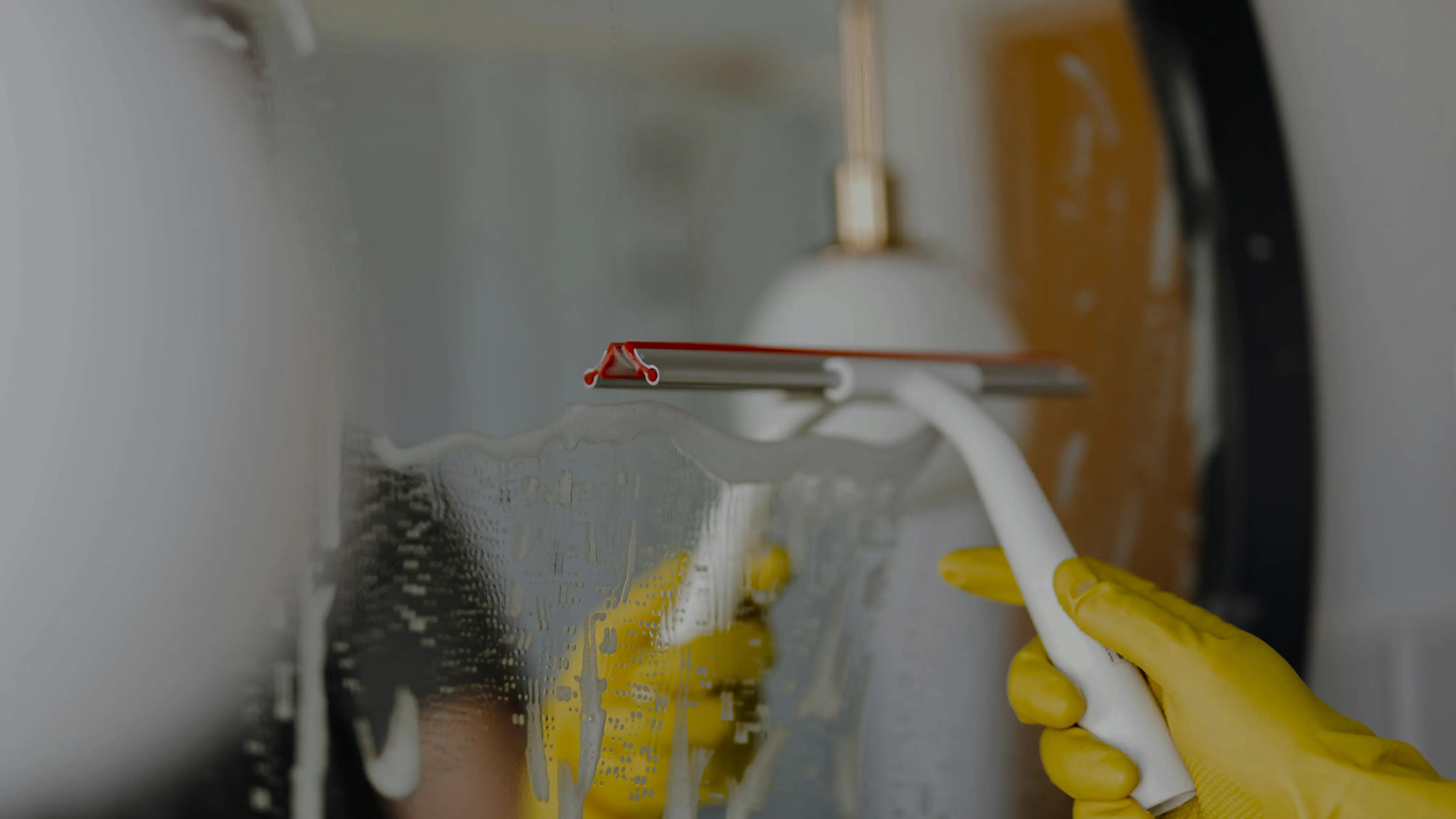 Man cleaning a bathroom.